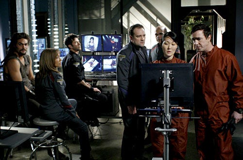Stargate Atlantis - Season 5, "The Seed" - Jason Momoa as Ronon Dex, Rachel Luttrell as Teyla Emmagan, Joe Flanigan as Lt. Col. John Sheppard, David Hewlett as Dr. Rodnay McKay, Linda Ko as a nurse, Paul McGillion as Dr. Beckett