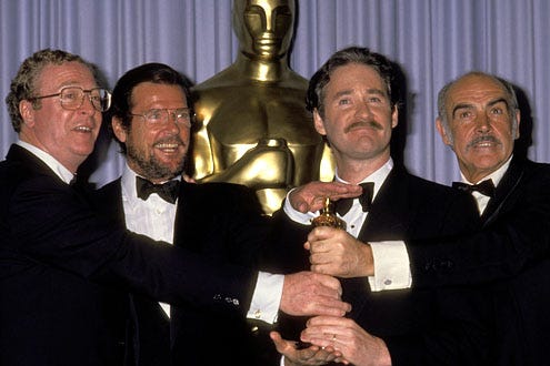 Michael Caine, Roger Moore, Kevin Kline and Sean Connery - The 61st Annual Academy Awards, March 29, 1989