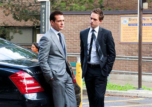 Suits - Season 1 - "Dog Fight" - Gabriel Macht as Harvey Specter and Patrick J. Adams as Mike Ross