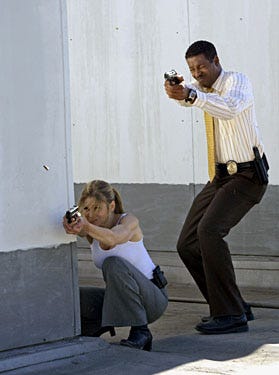 The Closer - Season 4, "Tijuana Brass" - Kyra Sedgwick as Dep. Chief Brenda Johnson, Corey Reynolds as Sgt. Gabriel
