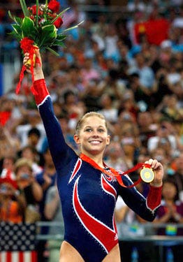 2008 Summer Olympics - Gold medalist  Shawn Johnson of the USA poses on the podium during the medal ceremony for the Women's Beam Final, August 19, 2008.