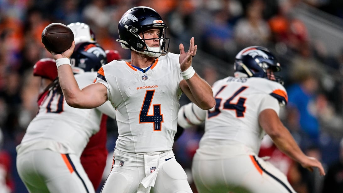 DENVER, CO - AUGUST 16: Denver Broncos quarterback Sam Ehlinger (4) sets to pass in the third quarter during a preseason game between the Arizona Cardinals and the Denver Broncos at Empower Field at Mile High on August 16, 2025 in Denver, Colorado.