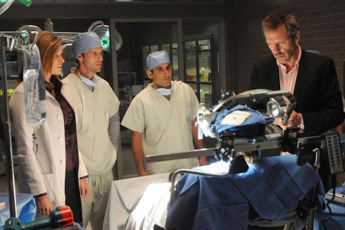 House - Season 7 - "Massage Therapy" - Guest star Vinessa Shaw, Jesse Spencer, Peter Jacobson and Hugh Laurie as House