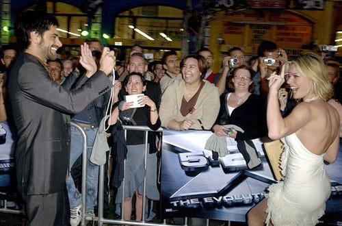John Stamos and Rebecca Romijn - The "X2: X-Men United" Los Angeles premiere, April 28, 2003