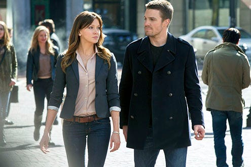 Arrow - Season 1 - "Pilot" - Katie Cassidy and Stephen Amell