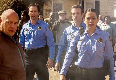 Under the Dome - Season 1 - "The Fire " - Dean Norris as James "Big Jim" Rennie, and Natalie Martinez as Deputy Linda