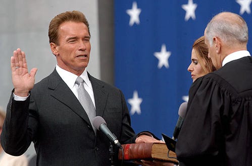 Arnold Schwarzenegger with his wife Maria Shriver - Takes the oath of office as California's 38th governor, November 17, 2003