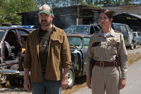 Supernatural - Season 6 - "Weekend at Bobby's" - Jim Beaver as Bobby and Kim Rhodes as Sheriff Mills