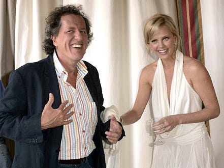 Geoffrey Rush and Charlize Theron - The 2004 Cannes Film Festival "The Life And Death Of Peter Sellers" lunch, May 22, 2004