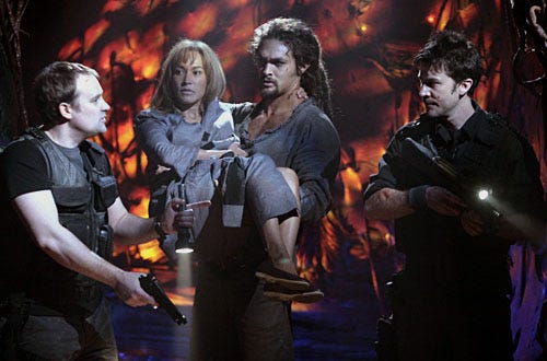 Stargate Atlantis - Season 5 Premiere, "Search and Rescue" - David Hewlett as Dr. Rodney McKay, Rachel Luttrell as Teyla Emmagan, Jason Momoa as Ronon Dex, Joe Flanigan as Lt. Col. John Sheppard