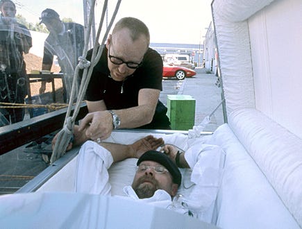 MythBusters - Adam Savage and Jamie Hyneman in coffin.