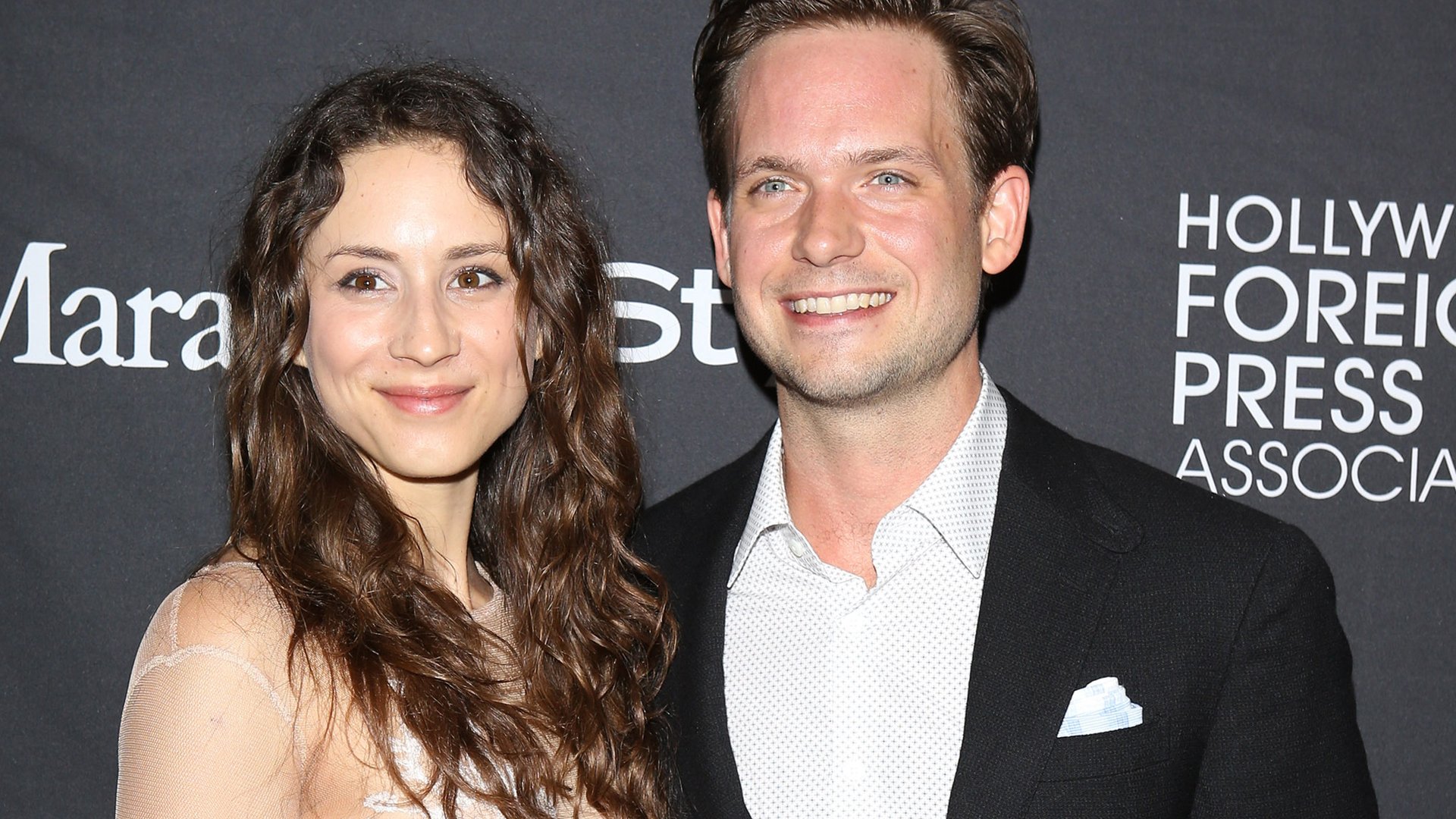 Troian Bellisario and Patrick J. Adams