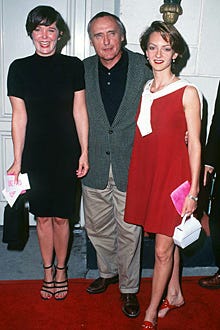 Dennis Hopper with Victoria Duffy and his daughter - The "Unzipped" premiere, July 27, 1995