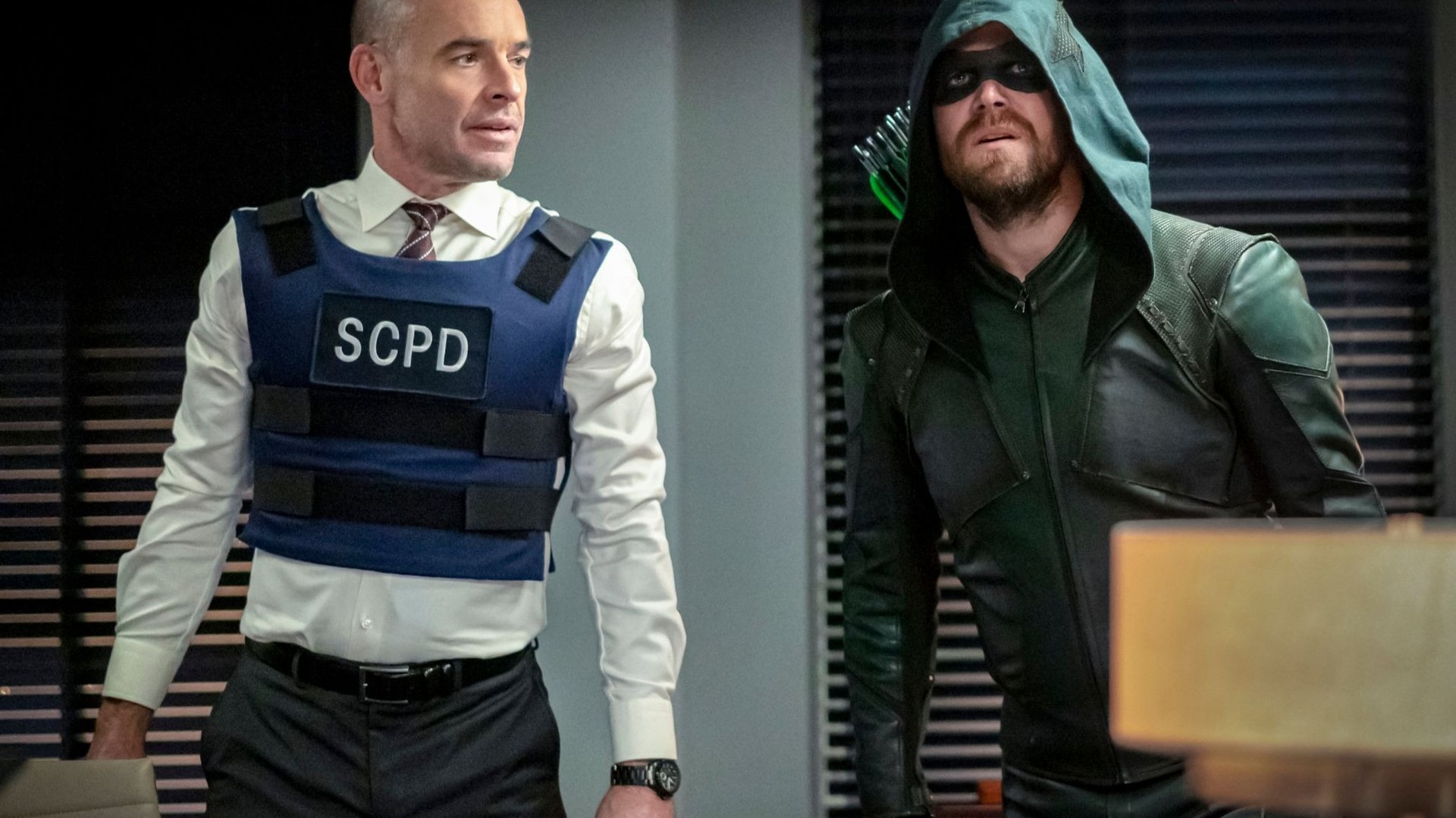Paul Blackthorne and Stephen Amell, Arrow