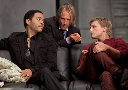 The Hunger Games - Lenny Kravitz as Cinna, Woody Harrelson as Haymitch Abernathy and Josh Hutcherson as Peeta Mellark