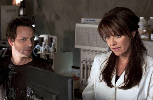 Sanctuary - Season 2 - "Hero" - Ryan Robbins as Henry and Amanda Tapping as Dr. Helen Magnus