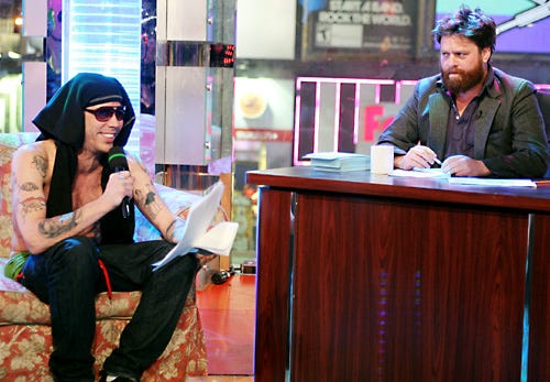 Zach Galifianakis (R) and Steve-O appear onstage during the "Jackassworld: 24 Hour Takeover" to celebrate the launch of Jackassworld.com at the MTV Times Square Studios - New York City - Feb. 24, 2008