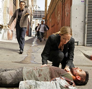 Eleventh Hour - Season 1, "Containment" -  Rufus Sewell as Dr. Hood and Marley Shelton as Rachel Young