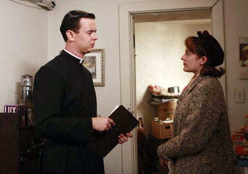 Mad Men - Season 2 finale - "Meditations On An Emergency" - Colin Hanks as Father Gill and Elisabeth Moss as Peggy Olson