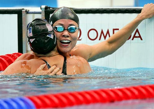 2008 Summer Olympics - Margaret Hoelzer of the USA congratulates Natalie Coughlin of the USA first place winner of the Women's 100m Backstroke Final, August 12, 2008.