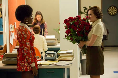 Mad Men - Season 7 - "A Day's Work" - Sola Bamis as Shirley and Elisabeth Moss as Peggy Olson
