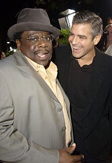 Cedric the Entertainer and George Clooney - The "Intolerable Cruelty" Los Angeles premiere, October 1, 2003