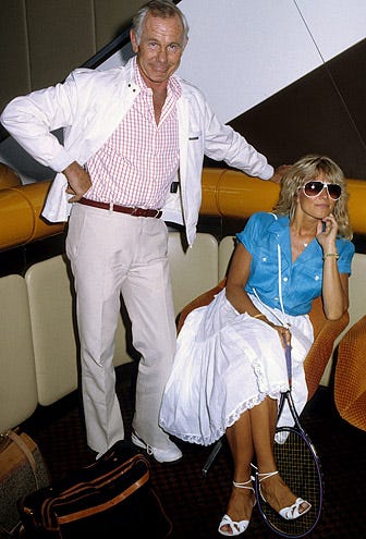 Johnny Carson and wife Alexis - Heathrow Airport, London, July 24, 1984
