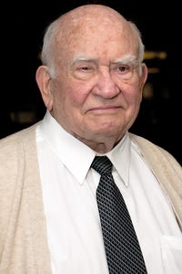 Edward Asner as Scully