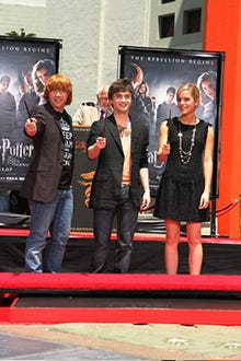 Rupert Grint, Daniel Radcliffe and Emma Watson - "Hand, Foot and Wand-Print Ceremony", July 2007