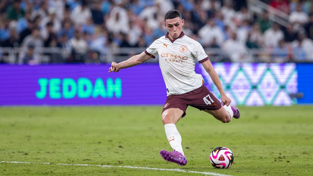 JEDDAH, SAUDI ARABIA - DECEMBER 19: Phil Foden of Manchester City shoots during the FIFA Club World Cup Semi-final match between Urawa Reds and Manchester City at King Abdullah Sports City on December 19, 2023 in Jeddah, Saudi Arabia.