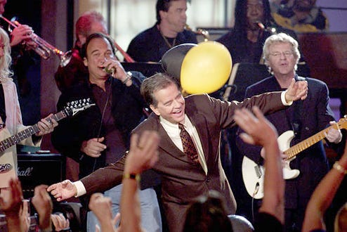 Dick Clark on stage with the SuperGroup - “American Bandstand’s 50th … A Celebration!" in California, April 21, 2002