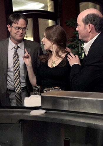 The Office - Season 8 - "After Hours" - Rainn Wilson as Dwight Schrute, Catherine Tate as Nellie Bertram and David Koechner as Todd Packer