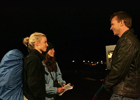 The Amazing Race 10 - Kellie & Jamie (here with host Phil Keoghan) are the 3rd team eliminated.
